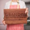 Person holding a wooden plaque with a tribute to 